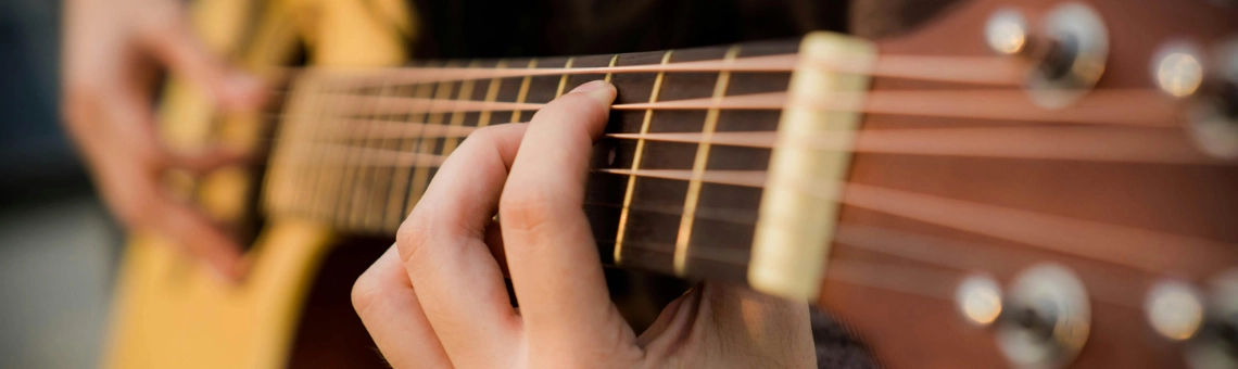 header-begeleiding-gitaar